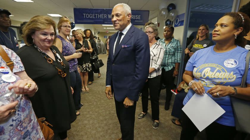 In this Sept. 7, 2018 photo, Mike Espy, a Democrat and President Bill Clinton's first agriculture secretary, speaks in Jackson, Miss., to supporters and volunteers in his campaign for November's special election to fill the unexpired term of U.S. Sen. Thad Cochran, R-Miss., who retired in April. He faces appointed Republican U.S. Sen. Cindy Hyde-Smith, R-Miss., Republican state Sen. Chris McDaniel, who almost unseated Cochran four years ago in the party's primary runoff, and Tobey Bernard Bartee, a former military intelligence officer who is also a Democrat. Party labels do not appear on the ballot. (AP Photo/Rogelio V. Solis)