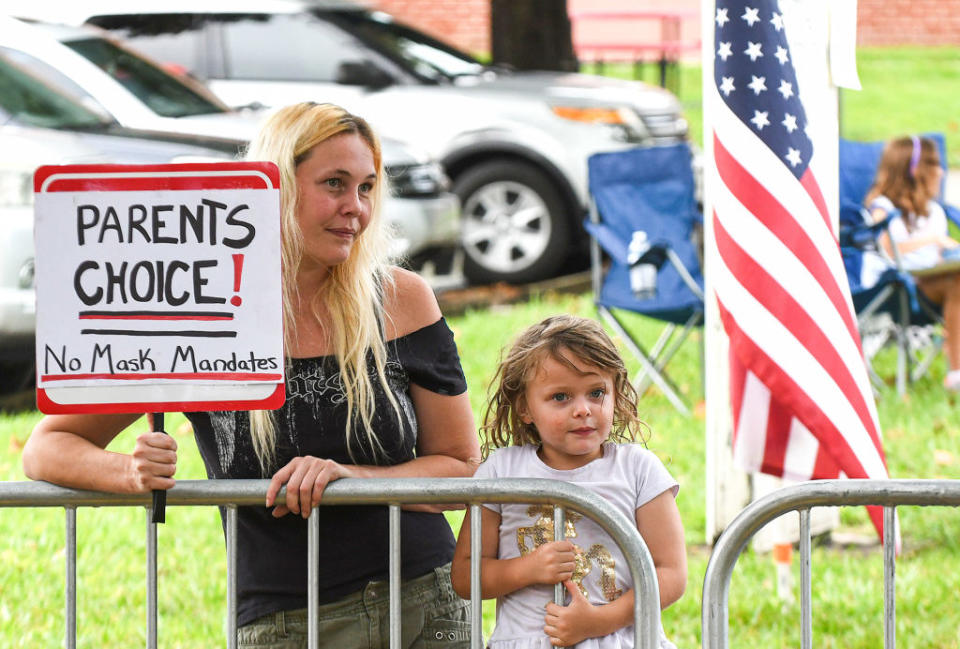 A protester outside the Volusia County School Board in Deland, Fla., on Sept. 14, 2021. The school board voted 3-2 to modify its mask mandate to allow parents to opt out of the requirement for their children.<span class="copyright">Paul Hennessy—SOPA Images/LightRocket/Getty Images</span>