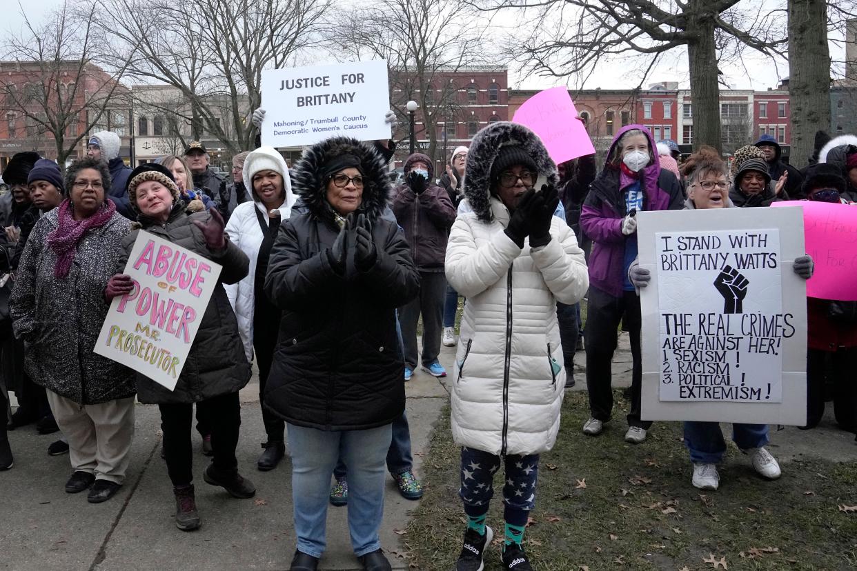 Supporters of Brittany Watts cheer at a rally Thursday, Jan. 11, 2024, in Warren Ohio. A grand jury has decided that Watts, who was facing criminal charges for her handling of a home miscarriage, will not be charged. (AP Photo/Sue Ogrocki)