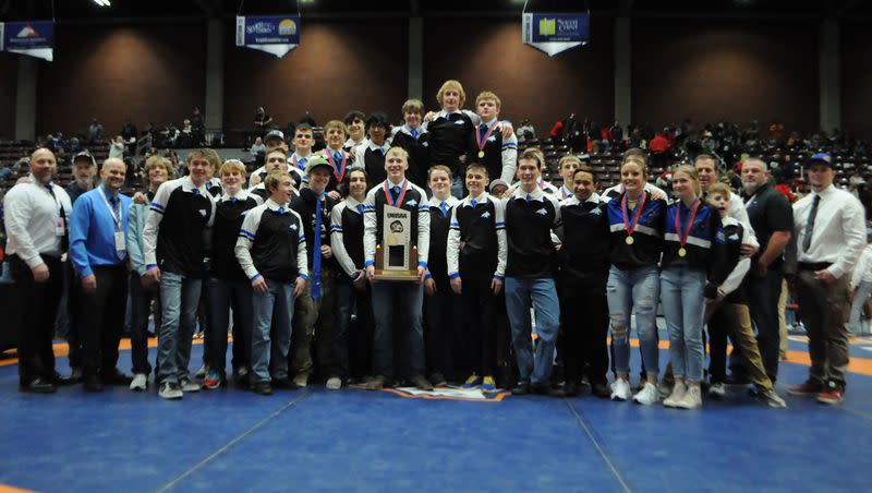 Panguitch’s boys wrestling team holds up its fifth consecutive trophy on Saturday, February 10, 2024, in Richfield. 