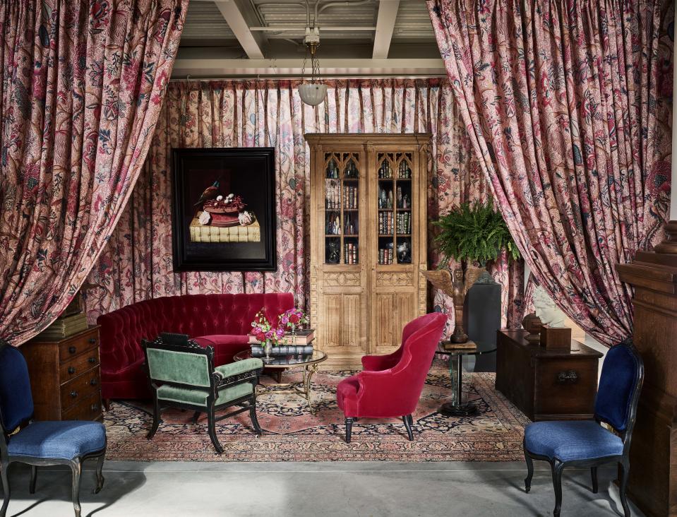 A ground-level salon, cocooned in La Maison Pierre Frey’s La Grande Corail fabric.