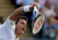 Britain Tennis - Wimbledon - All England Lawn Tennis & Croquet Club, Wimbledon, England - 27/6/16 Canada's Milos Raonic in action against Spain's Pablo Carreno Busta REUTERS/Tony O'Brien