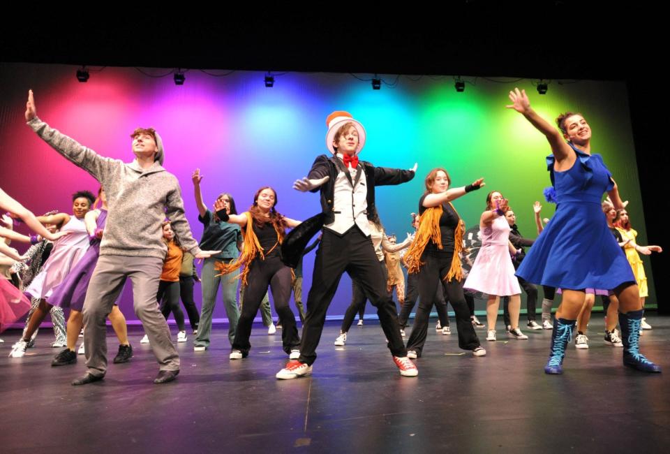 "Cat in The Hat" Alex Norton, center, leads a dance during rehearsal of Weymouth High Theatre Company's "Seussical" at the Maria Chapman Middle School in Weymouth, Wednesday, Nov. 9, 2022. The show will be performed Nov. 18, 19, and 20 at the Chapman Middle School.