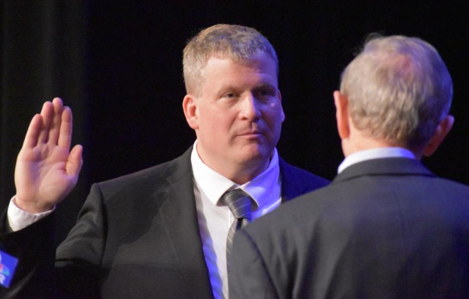 Bristol County Sheriff Paul Heroux being sworn in by Secretary of the Commonwealth William Galvin Tuesday, Jan. 3 at B.M.C. Durfee High School in Fall River.