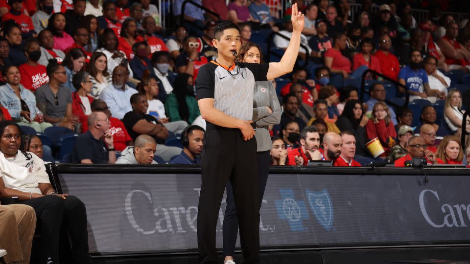 Hwang officiates a WNBA game between the Connecticut Sun and the Washington Mystics on May 23. - Stephen Gosling/NBAE/Getty Images