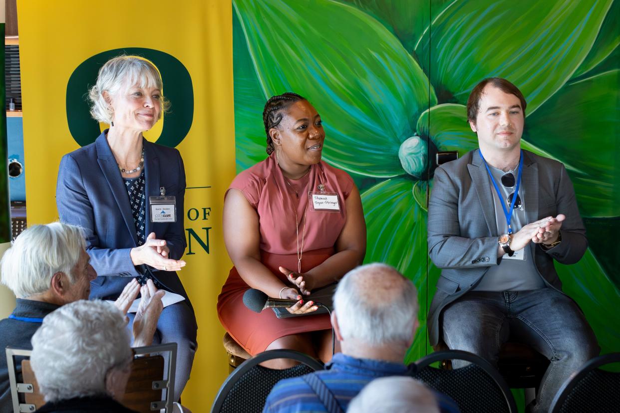 Kaarin Knudson, left, Shanaé Joyce-Stringer and Stefan Strek answer questions during a forum for Eugene’s mayoral candidates March 15 in Eugene.