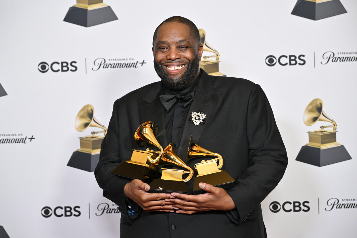 Killer Mike smiles with his three Grammy awards after the ceremony on Feb. 4 in Los Angeles. (Michael Buckner/Billboard via Getty Images)