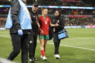 Morocco's Elodie Nahla Nakkach leaves the pitch after getting injured during the Women's World Cup Group H soccer match between Germany and Morocco in Melbourne, Australia, Monday, July 24, 2023. (AP Photo/Hamish Blair)