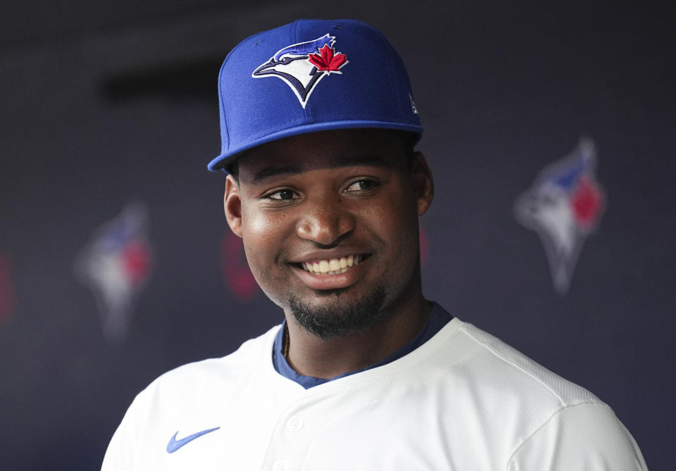 TORONTO, ON - JUNE 18: Orelvis Martinez #13 of the Toronto Blue Jays smiles from the munition after existence titled up to the aggroup from the secondary leagues aweigh of activity against the Beantown Red Sox in their MLB mettlesome at the actress Centre on June 18, 2024 in Toronto, Ontario, Canada. (Photo by Mark Blinch/Getty Images)