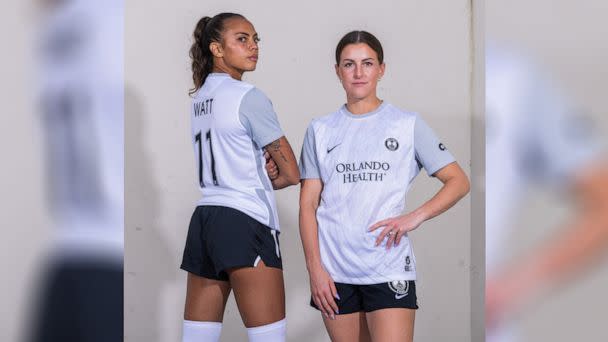 PHOTO: In a post made to the Orlando Pride Instagram account, players Ally Watt and Haley McCutcheon pose in the team's new dark shorts. (@orlpride/Instagram)