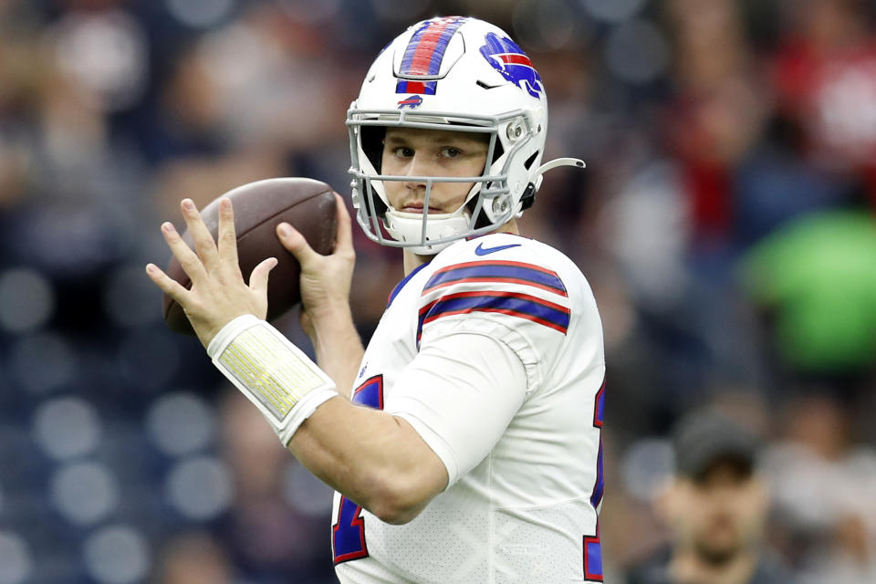 Quarterback Josh Allen caught a touchdown pass to begin his first career playoff start. (Photo by Tim Warner/Getty Images)