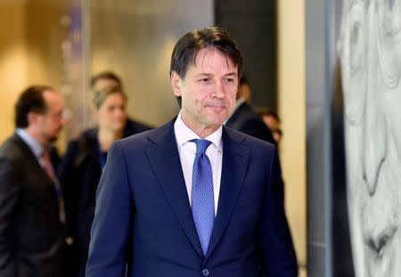 FILE PHOTO: Italian Prime Minister Giuseppe Conte arrives to take part in an emergency European Union leaders summit on immigration, in Brussels, Belgium June 24, 2018. REUTERS/Eric Vidal