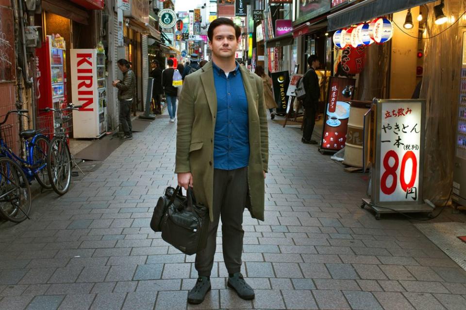 Mark Karpelès in Tokyo’s Shinjuku district. The former Mt. Gox CEO, who once felt safe leaving his laptop on a park bench, refused to set down his bag for fear of theft.