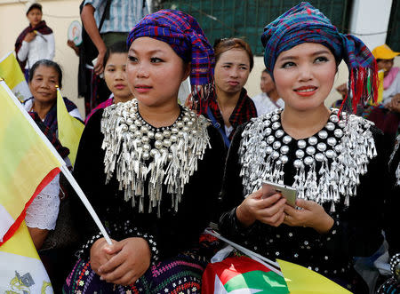 Women from Kachin State wait outside the residence of Cardinal Charles Maung Bo, Archbishop of Yangon, where Pope Francis will be staying during his visit in Yangon, Myanmar November 27, 2017. REUTERS/Jorge Silva