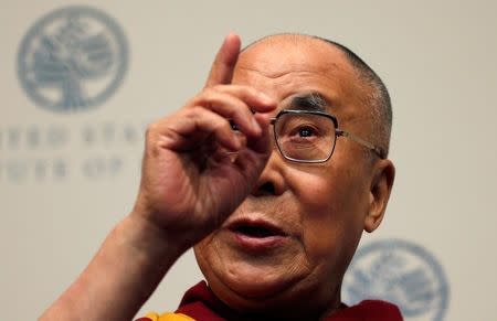 The Dalai Lama speaks at the U.S. Institute of Peace in Washington, D.C., U.S. June 13, 2016.REUTERS/Kevin Lamarque