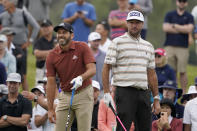 Sergio Garcia, of Spain, left, watches his shot on the 15th tee as Bubba Watson looks on during the second round of the U.S. Open Golf Championship, Friday, June 18, 2021, at Torrey Pines Golf Course in San Diego. (AP Photo/Jae C. Hong)