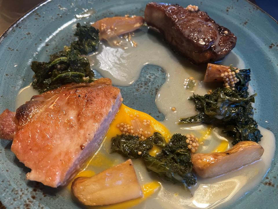 Chef de cuisine Jacob Demars braises his pork shoulder for 24 hours, brines the pork chop for 24 hours and serves it with a butternut squash puree at Table 128.