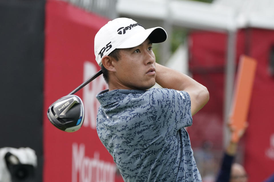 Collin Morikawa drives off the 16th tee during the third round of the Rocket Mortgage Classic golf tournament at Detroit Country Club, Saturday, July 1, 2023, in Detroit. (AP Photo/Carlos Osorio)