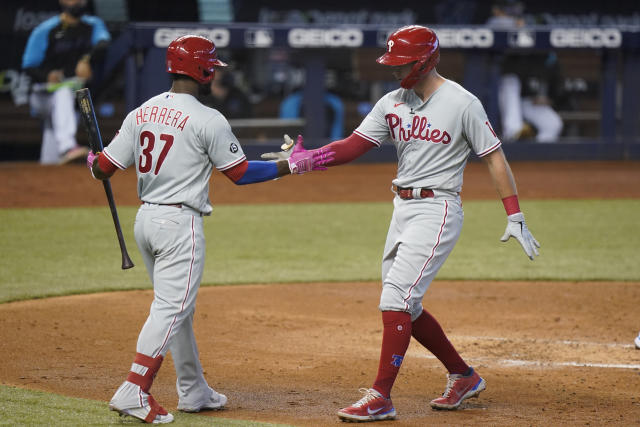 Herrera's hitting, arm helps Phillies beat Marlins 3-2