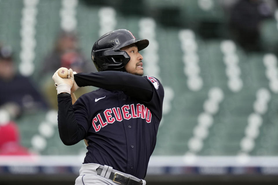 Cleveland Guardians' Steven Kwan connects for a single to left during the seventh inning in the first game of a baseball doubleheader against the Detroit Tigers, Tuesday, April 18, 2023, in Detroit. (AP Photo/Carlos Osorio)