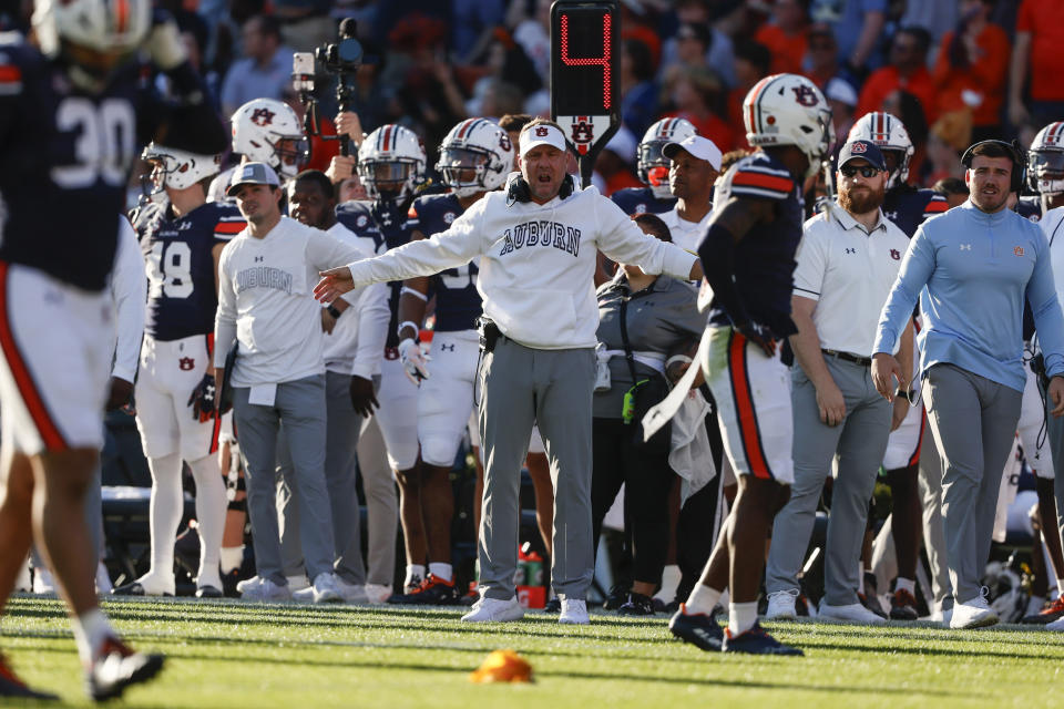 Auburn head coach Hugh Freeze reacts to a flag during the first half of an NCAA college football game against New Mexico State Saturday, Nov. 18, 2023, in Auburn, Ala. (AP Photo/Butch Dill)