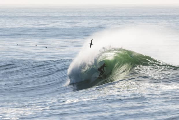 In between days of rain and wind, the Eastside of Santa Cruz had its moments. Pictured here is Jackson Taylor, tucking into a little tube just after sunrise.<p>Ryan "Chachi" Craig</p>