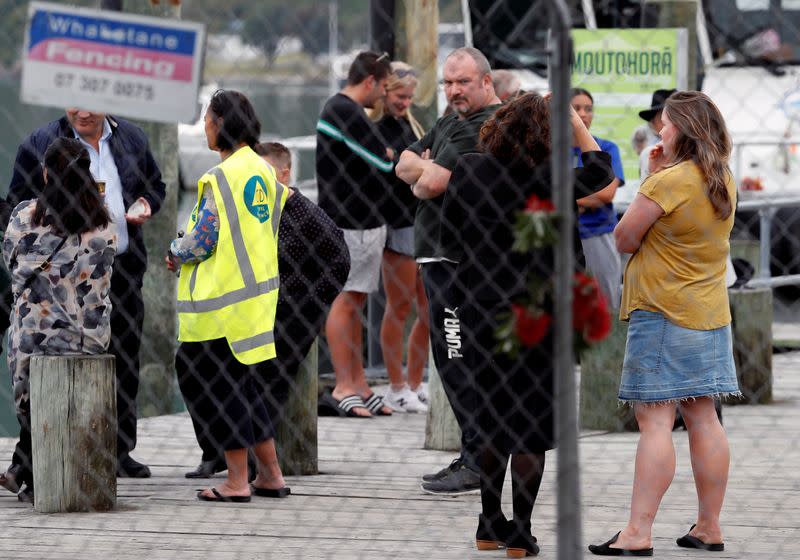 Relatives wait for rescue mission, following the White Island volcano eruption in Whakatane