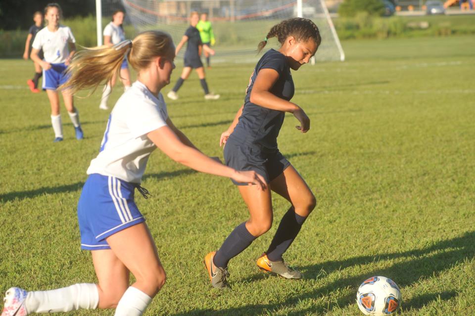 Galion's Mia Felder battles for a loose ball.