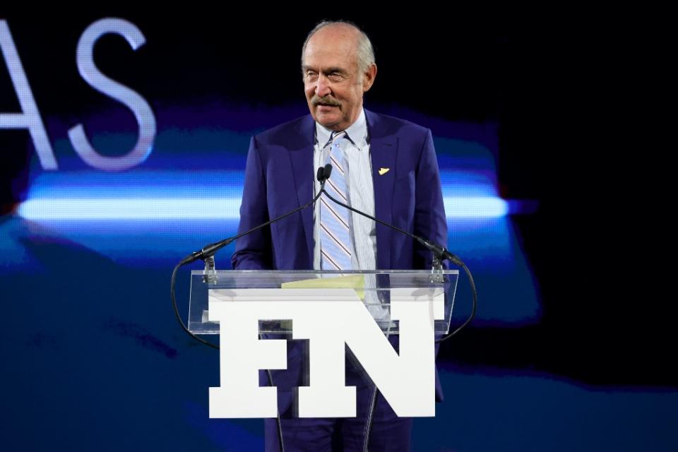 Stan Smith speaks onstage at the 35th annual Footwear News Achievement Awards - Credit: Getty Images for Footwear News