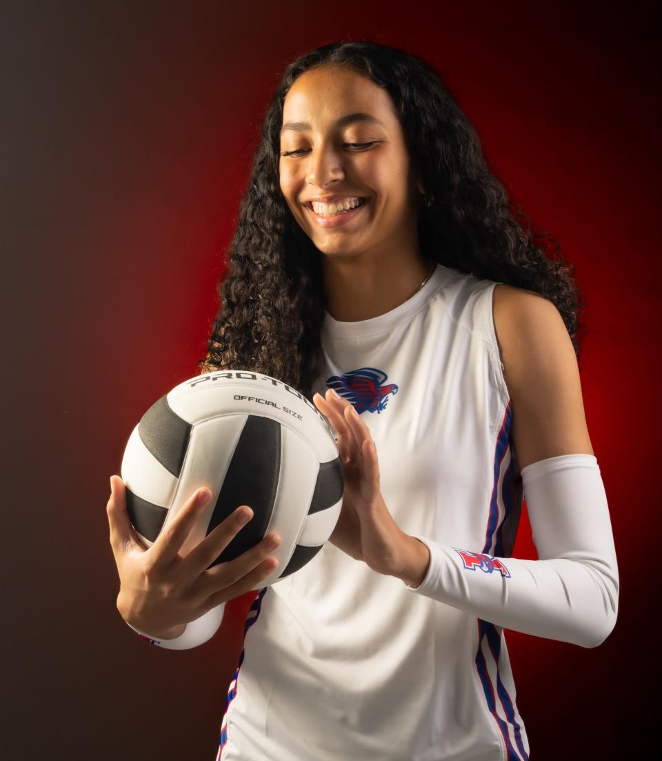Hays middle blocker Lusia Langi loves her curls because it makes her feel more connected with Tonga — that's where her family is from. She will continue her volleyball career next year at Utah Tech University in St. George, and then perhaps go into coaching.
