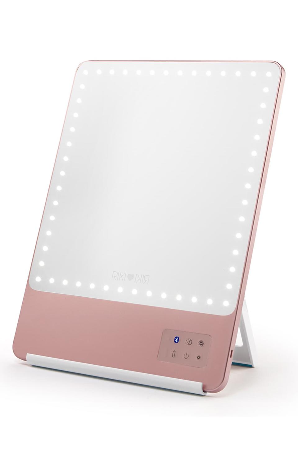 9) RIKI Skinny Lighted Mini Vanity Mirror