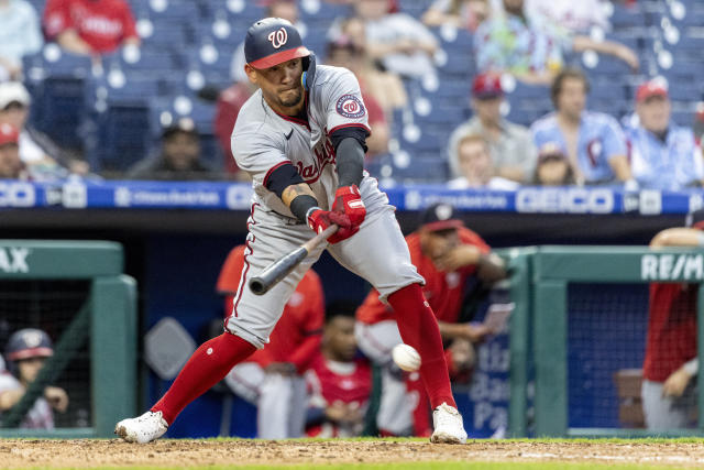 Philadelphia Phillies' Alec Bohm hits a two run home run during the seventh  inning of a baseball game against the Washington Nationals, Sunday, Sept.  11, 2022, in Philadelphia. (AP Photo/Laurence Kesterson Stock