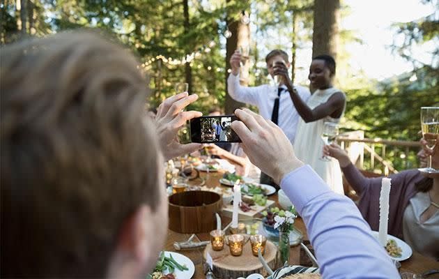 You can take photos of the bride as she's walking up the aisle. Photo: Getty Images