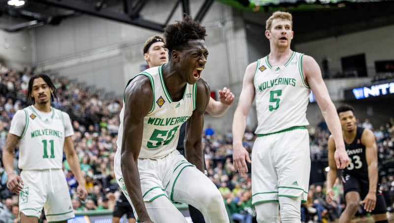 Trey Woodbury and Justin Harmon each scored 17 points and Aziz Bandaogo recorded a 15-point, 12-rebound double-double to lead Utah Valley to a 74-68 win over Cincinnati in the quarterfinals of the NIT on Wednesday night at the UCCU Center.