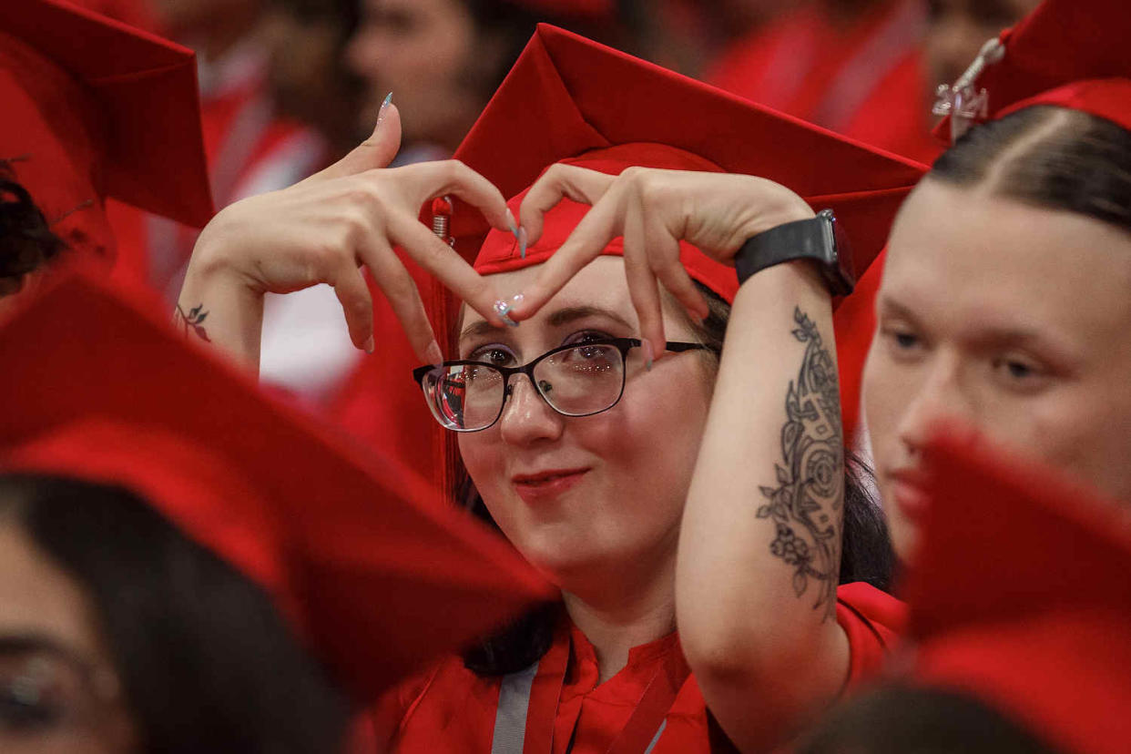 Seminole Ridge Community High School students prepare for graduation ceremonies at the South Florida Fairgrounds and Expo Center in unincorporated Palm Beach County, Fla., on May 23, 2024.