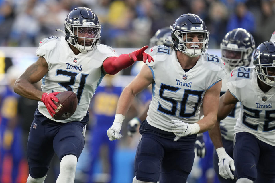 Tennessee Titans safety Kevin Byard (31) celebrates with teammates after intercepting a pass against the Los Angeles Chargers during the second half of an NFL football game in Inglewood, Calif., Sunday, Dec. 18, 2022. (AP Photo/Ashley Landis)