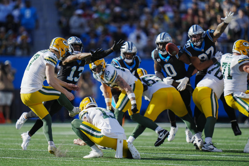 Green Bay Packers place-kicker Anders Carlson kicks a field goal against the Carolina Panthers during the first half of an NFL football game Sunday, Dec. 24, 2023, in Charlotte, N.C. (AP Photo/Rusty Jones)