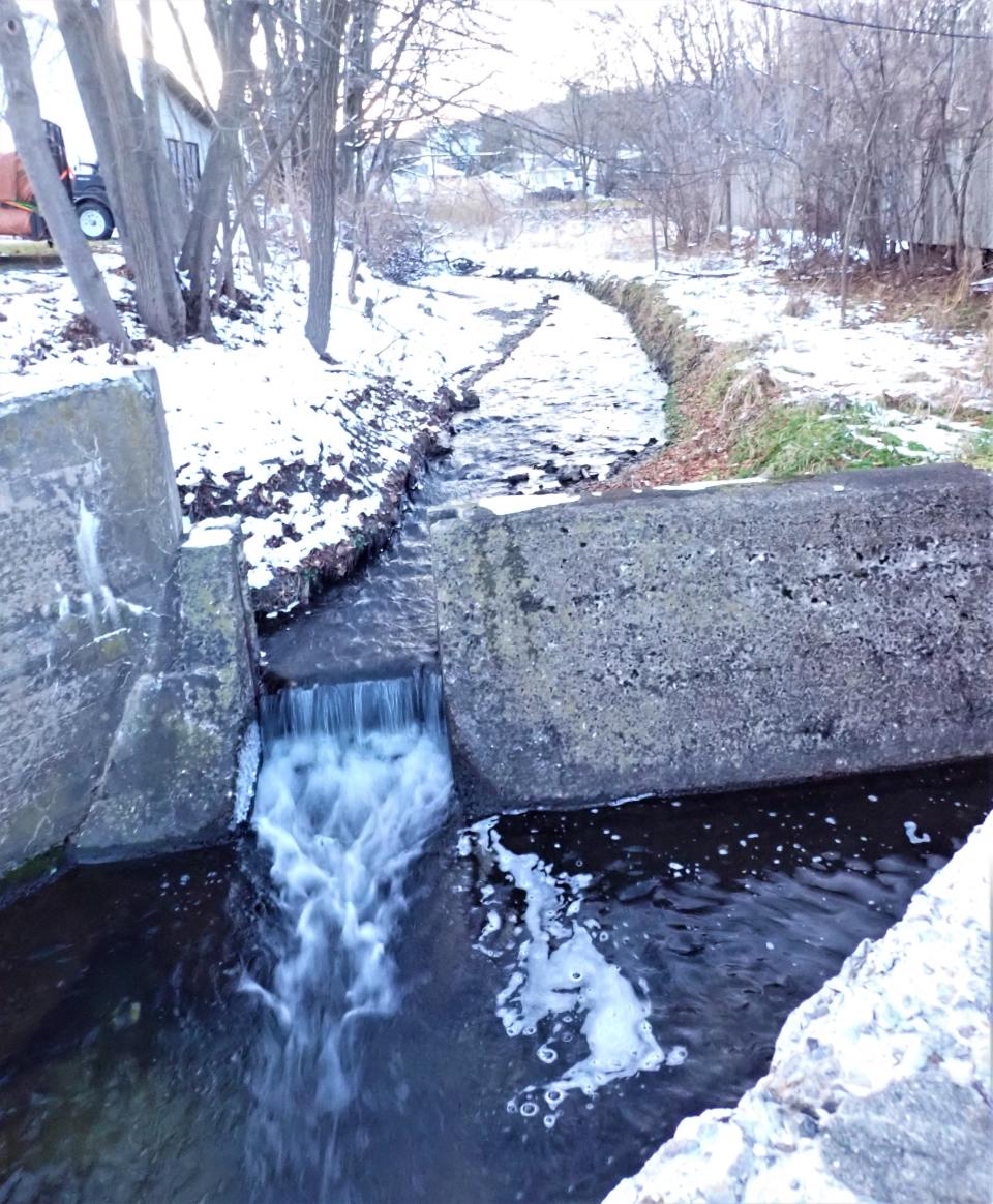 The Paulins Kill flows through the remains of a dam which provided power to old mills on Mill Street, Newton, on Wednesday, Dec. 14, 2022. The Paulins Kill Watershed is seeking volunteers to monitor the river for road salt at various points along the stream's nearly 42 miles.