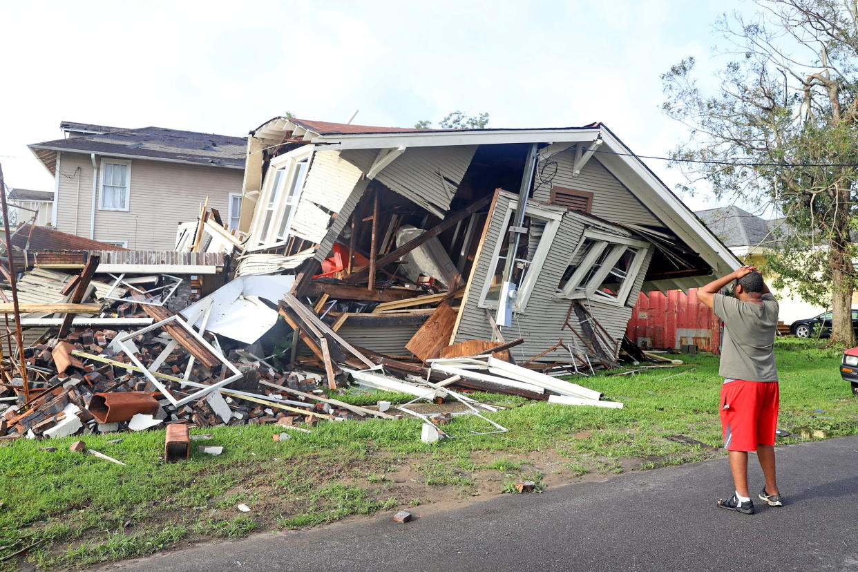 Dartanian Stovall looks at the house that collapsed with him inside during the height of Hurricane Ida in New Orleans on Aug. 30.