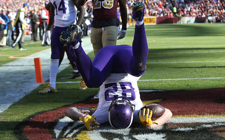 Nov 13, 2016; Landover, MD, USA; Minnesota Vikings tight end Kyle Rudolph (82) scores a touchdown against the Washington Redskins in the second quarter at FedEx Field.
