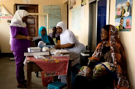 The Wider Image: Tanzania's Zanzibar begins to register traditional healers