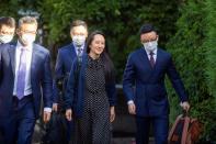 FILE PHOTO: Huawei Technologies Chief Financial Officer Meng Wanzhou leaves her home to attend court in Vancouver