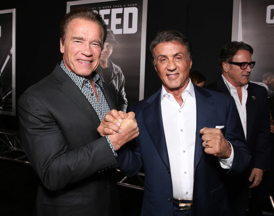 Old pals Arnold Schwarzenegger and Sylvester Stallone at the premiere of <em>Creed</em> on Nov. 19, 2015. (Photo: Todd Williamson/Getty Images)