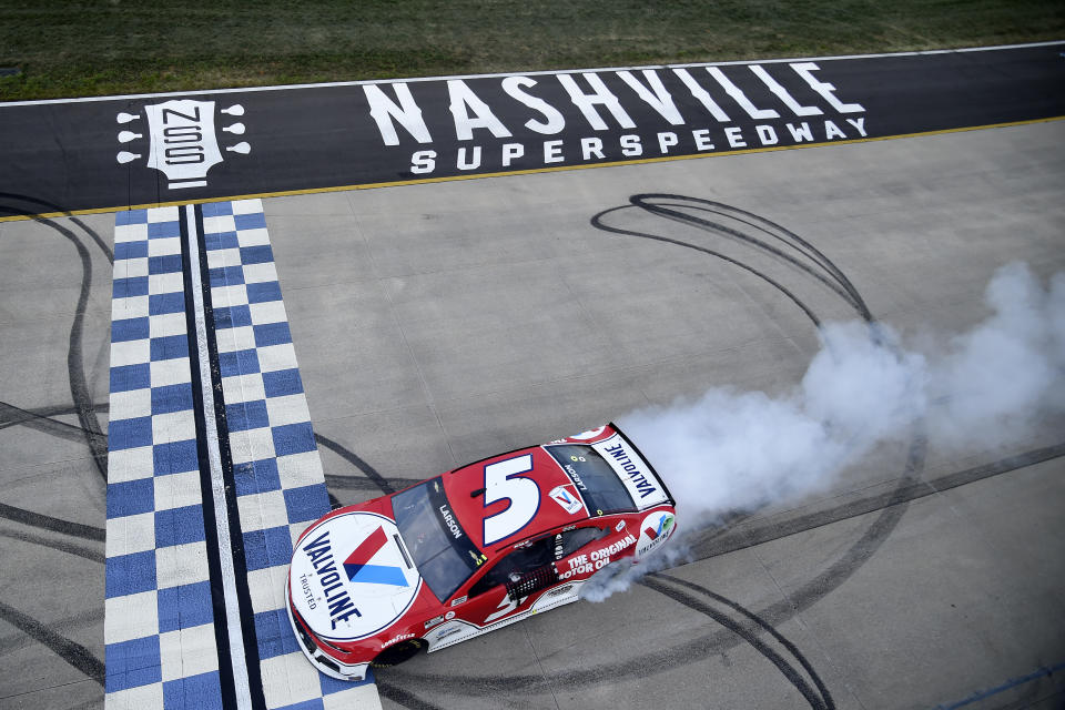 LEBANON, TENNESSEE - JUNE 20: Kyle Larson, driver of the #5 Valvoline Chevrolet, celebrates with a burnout after winning the NASCAR Cup Series Ally 400 at Nashville Superspeedway on June 20, 2021 in Lebanon, Tennessee. (Photo by Logan Riely/Getty Images) | Getty Images