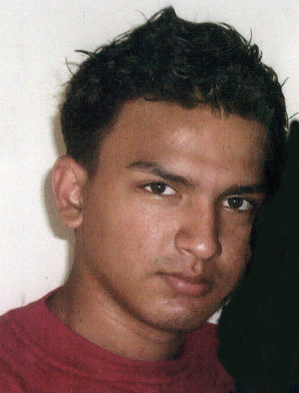 In this undated photo provided by the Federal Bureau of Investigation, Juan Elias Garcia is shown. Garcia, a purported member of the MS-13 street gang charged in the killings of his 19-year-old girlfriend and her toddler son was ordered held without bail during his arraignment Monday, March 31, 2014. Speaking through an interpreter, Garcia, 21, entered a not guilty plea to murder, murder conspiracy and firearms charges before U.S. District Court Judge Joseph Bianco in Central Islip, on Long Island. (AP Photo/FBI)