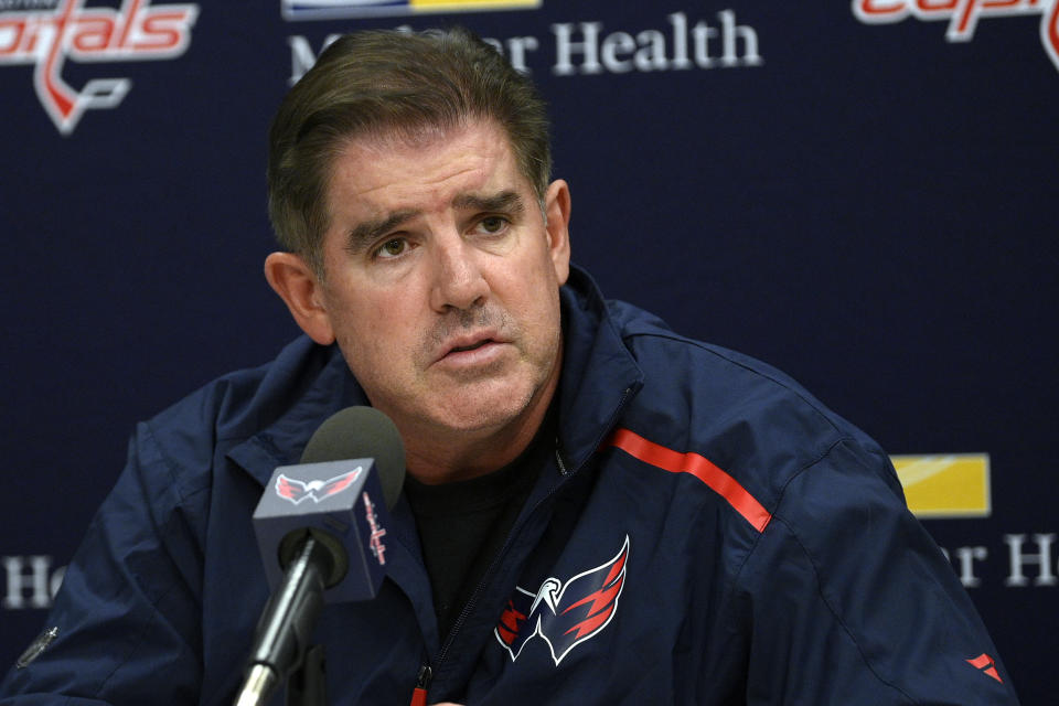 FILE - Washington Capitals head coach Peter Laviolette talks during media availability at the team's NHL hockey training camp, Thursday, Sept. 23, 2021, in Arlington, Va. The New York Rangers have hired Laviolette as their next coach, bringing in a seasoned veteran with Stanley Cup-winning experience to replace Gerard Gallant, the team announced Tuesday, June 13, 2023.(AP Photo/Nick Wass, File)