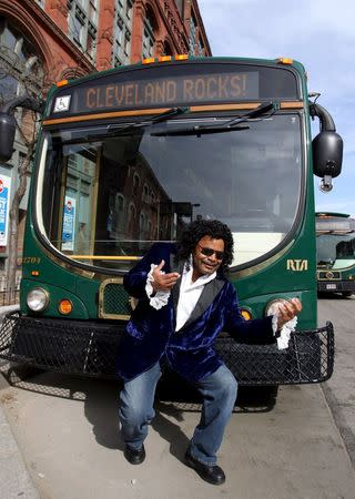 Orlando Boyington, a Cleveland regional Transit Authority Trolley driver poses as Lionel Richie as part of the Rock and Roll Hall of Fame Induction week in Cleveland, Ohio April 15, 2015. REUTERS/Aaron Josefczyk