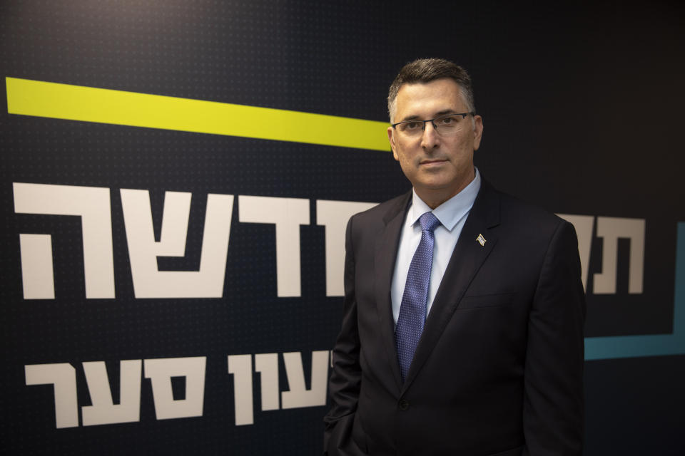 Israeli politician Gideon Saar poses for a photo at the party headquarters in Tel Aviv, Israel, Thursday, Jan. 14, 2021. Saar is promising "new hope" for voters ahead of March elections, and a different approach to relations with the United States after the four-year lovefest between Prime Minister Benjamin Netanyahu and President Donald Trump. (AP Photo/Sebastian Scheiner)