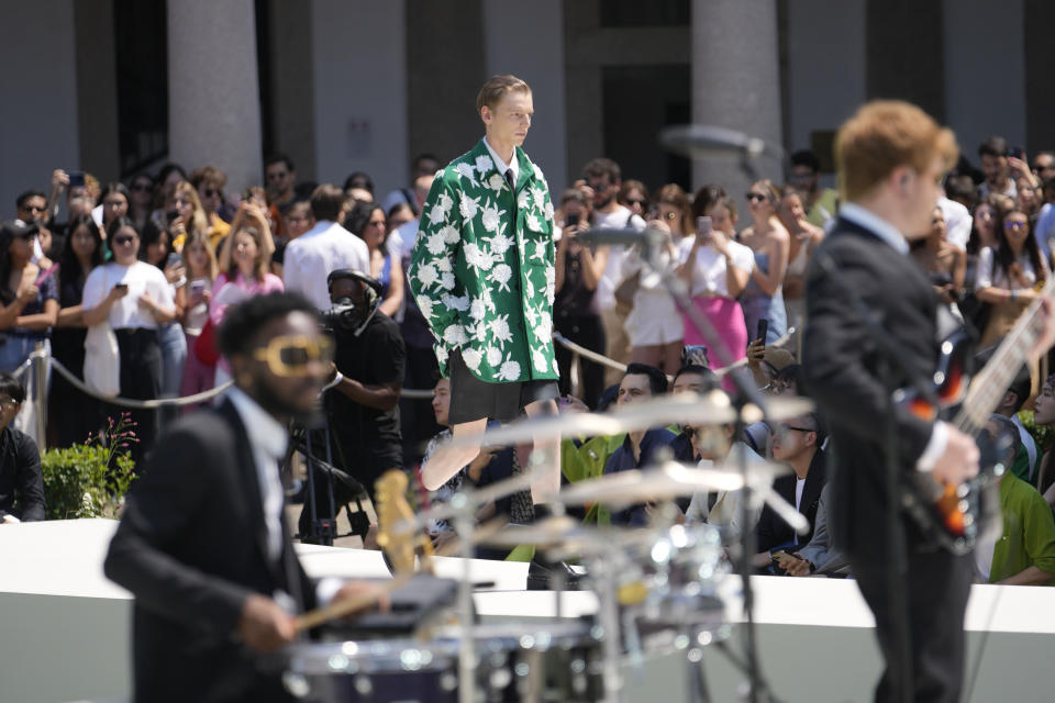 A model wears a creation as part of the Valentino men's Spring Summer 2024 collection presented in Milan, Italy, Friday, June 16, 2023. (AP Photo/Luca Bruno)