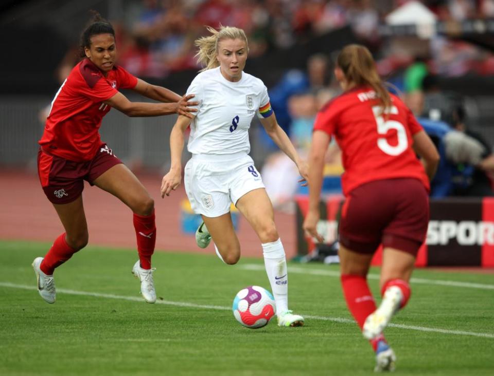 Coumba Sow of Switzerland (left) challenges England captain Leah Williamson.